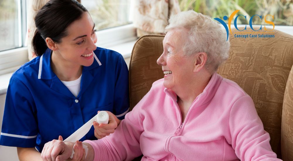 Caregiver and elderly woman sharing a joyful moment, illustrating compassionate care.